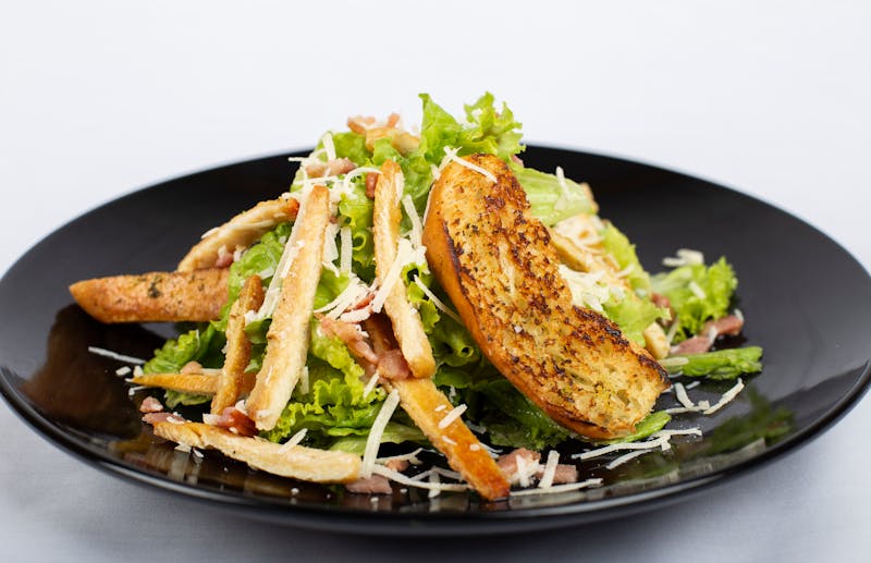 Caesar salad with parmesan cheese and croutons